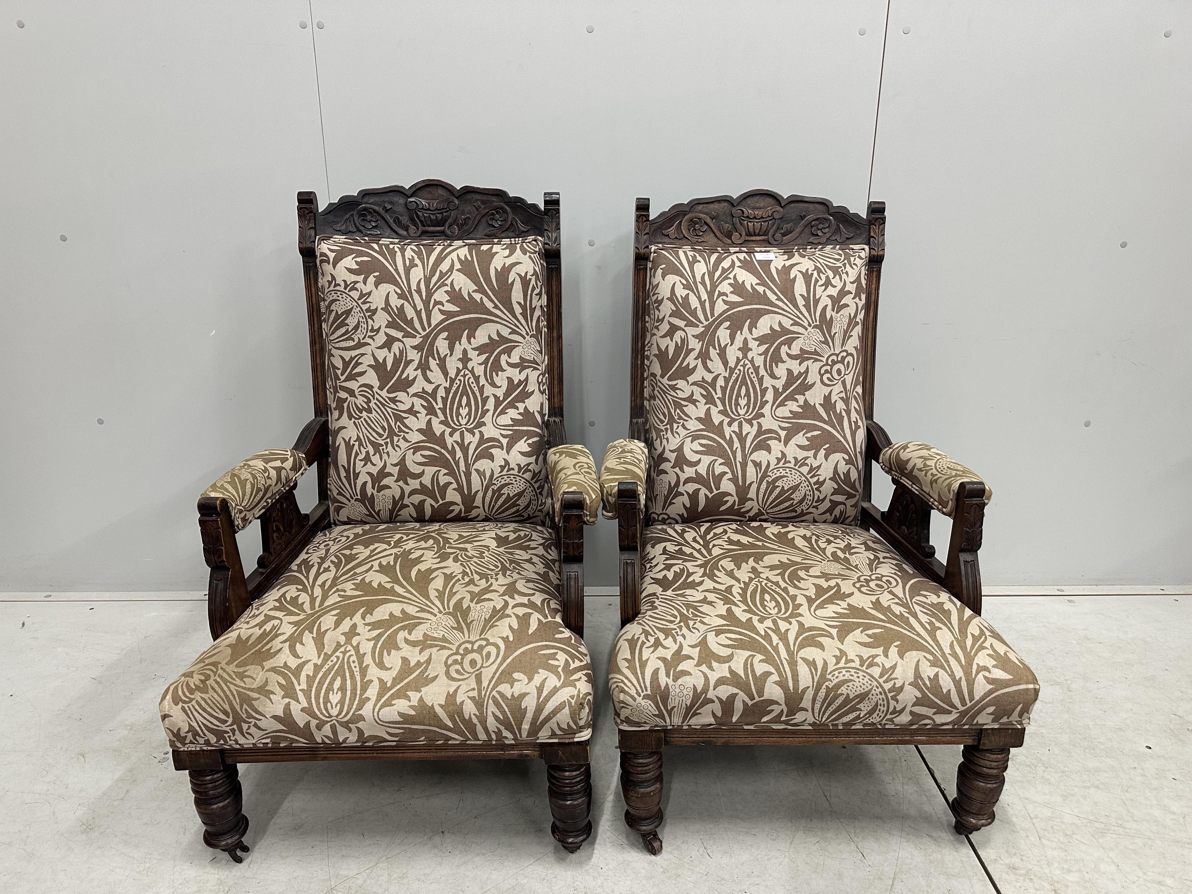 A pair of Victorian mahogany upholstered open armchairs, width 56cm, depth 62cm, height 101cm. Condition - fair